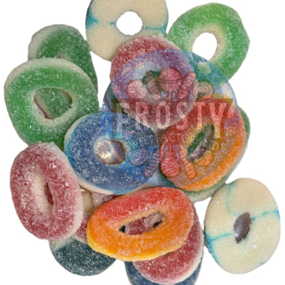 Colorful gummy candy rings on a white background